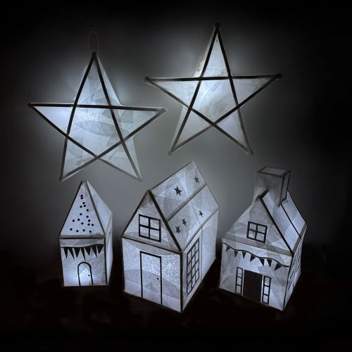 a photo of star-shaped lanterns and house-shaped lanterns